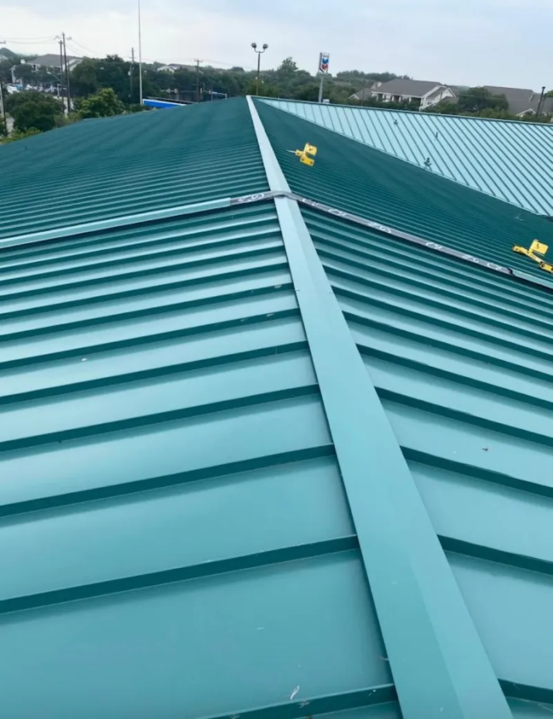 Green commercial metal roof ridge and valley for Metal Roof Repair in Brownfield